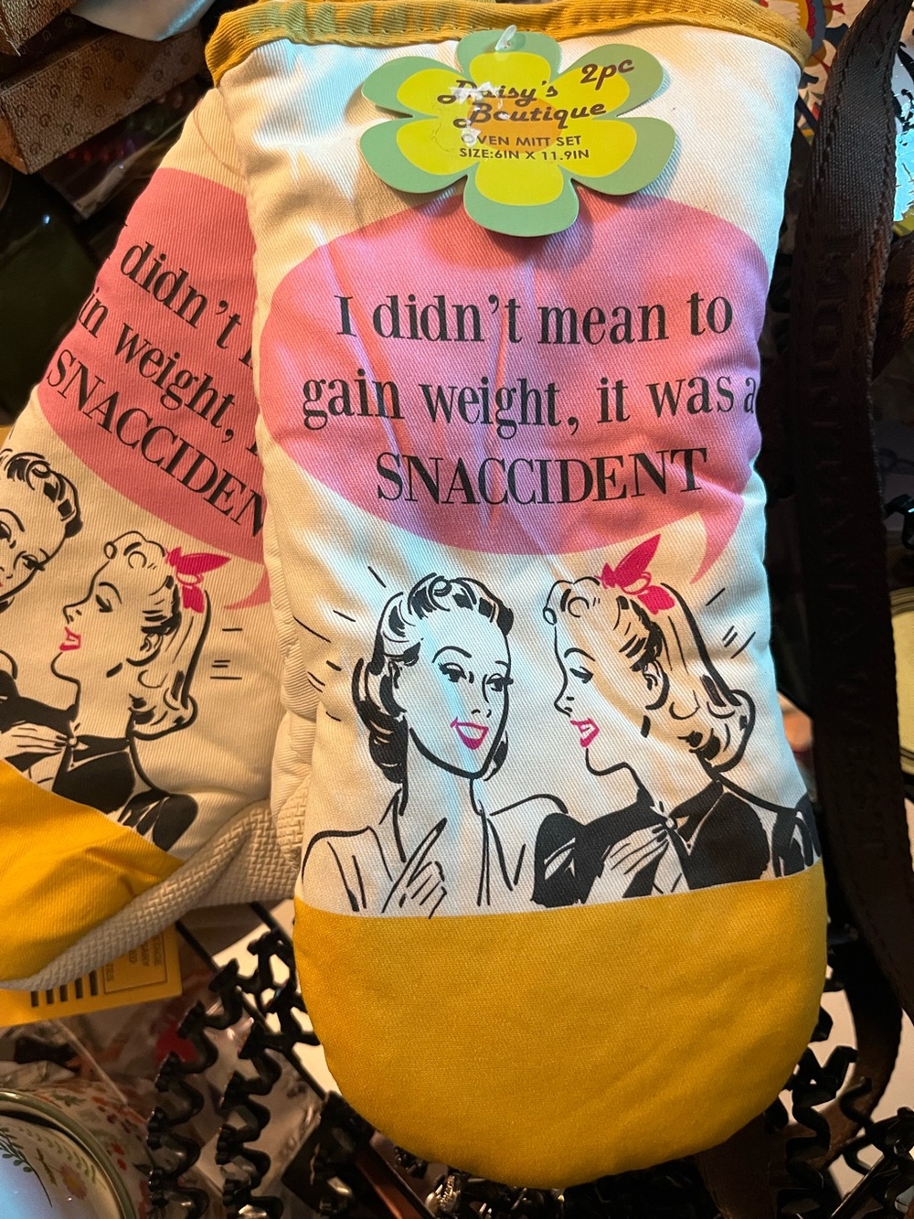 "Snaccident"  oven mitt set from the Daisy Boutique Brand  Pink and Yellow